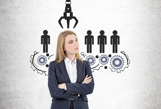 Blond crossed arms businesswoman recruited