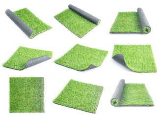 Patch of green artificial grass on a white background