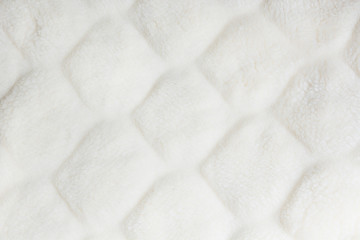 White fur close up background. Texture, abstract pattern.