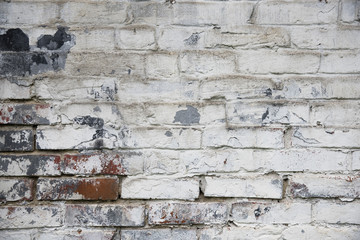 Fragment of whitewashed old brick wall, background