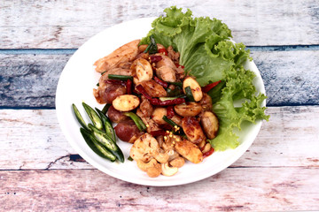 Spicy fried jackfruit seeds and chicken with roasted chile paste.