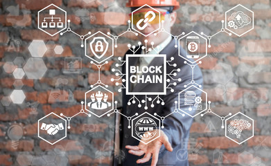 Businessman in safety helmet and glass offers blockchain microchip (circuit) icon on virtual...