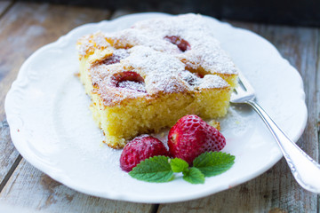 strawberry cake on wood