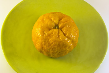 Tangerine on Plate