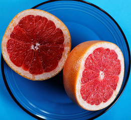 Grapefruit halves close-up on a plate