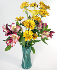 Colorful spring summer flower arrangement in vase.