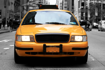 Fototapeta na wymiar Taxi, retro car yellow color on the road