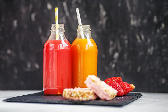 Fruit juices for children. Strawberries and dessert. The concept