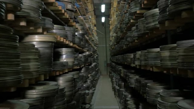 Thousands of film reels being stored in film archive.