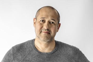 Fototapeta premium Portrait of a thoughtful man on a white background