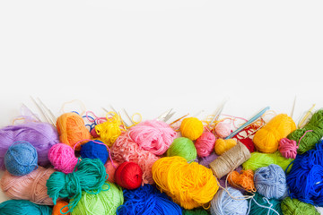 Colored balls of yarn. View from above. Rainbow colors. All colors. Yarn for knitting. Skeins of...