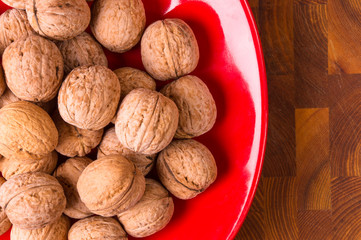 walnuts in red plate