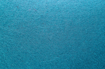 Fototapeta na wymiar Blue Color Felt Texture Background. Fiber texture of felt close-up
