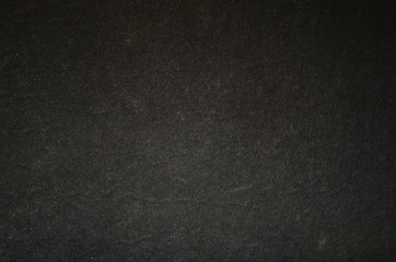 Black graphite texture of cardboard. Rough surface for background