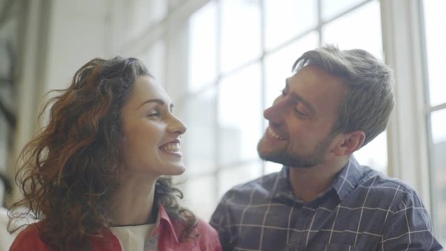 Couple working on project together