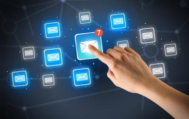 Hand touching mail icon
