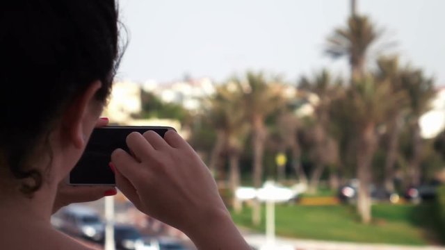High quality video of woman taking pictures on the vacations in real 1080p slow motion 250fps