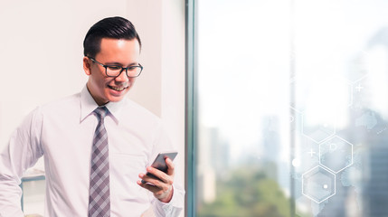 Business man using smart phone on window with futuristic technology connection shape over the network connection background