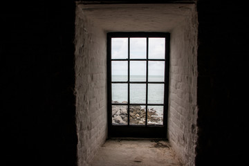 Fototapeta na wymiar looking out lighthouse window