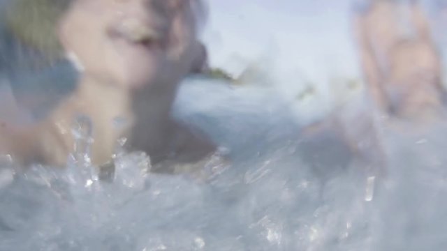Children swimming and splashing water
