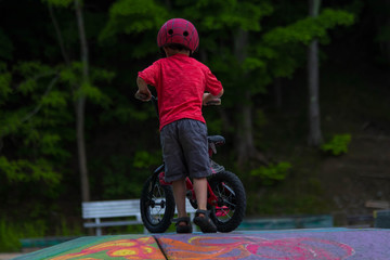 Boy riding bike at at skate park