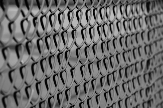 Closeup of a fence made of metal wire grids