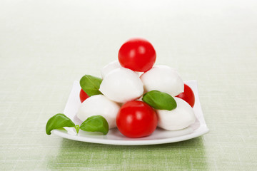 Mozzarella with tomatoes.