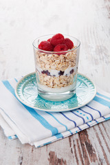 Oatmeal with yogurt and fruits.