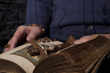 Old woman reading bible