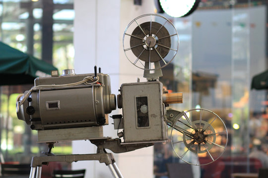 Old movie projector with film