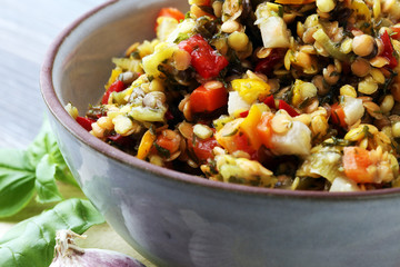 Lentil curry salad with carrot, cauliflower, broccoli and onion in a bowl. Healthy lifestyle. Diet menu