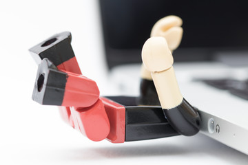 USB stick man with head in laptop