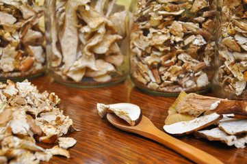 Dried porcini mushrooms. Background with dry mushrooms, boletus edulis as spice for cooking