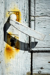 Weather-Beaten White Door Handle