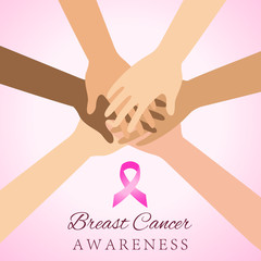 Diverse women hands joining for breast cancer awareness
