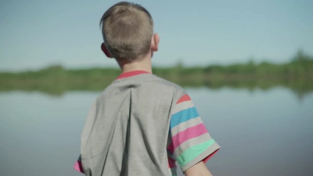 Boy throwing stones