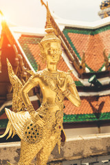 Golden angel statue of Temple of the Emerald Buddha (Wat pra kaew) and Grand palace ,Bangkok,Thailand