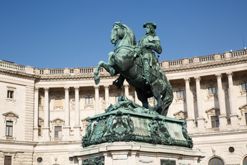 Fototapeta na wymiar statue of Prince Eugene and facade of Neue Burg in Hofburg Palace. Vienna
