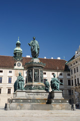 Obraz premium Statue of the emperor Franz I situated on the inner courtyard of the hofburg palace in Vienna