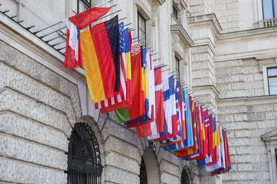 International set of flags on Hofburg palace. Vienna