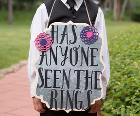 Has Anyone Seen the Rings Sign held by ring bearer