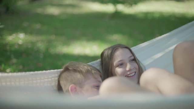 Children in hammock together
