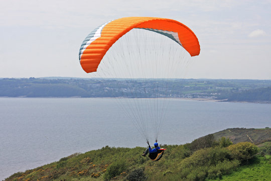 paraglider above the coast