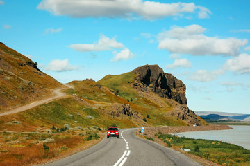 Fototapeta na wymiar Road leading to mountains, icelandic landscape