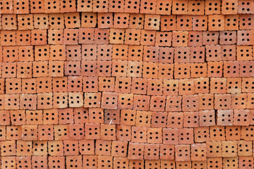 Stack of orange brick section for texture background.