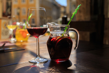 Sanrgiya with fruit ingredients in the decanter. Dripping on the glass.