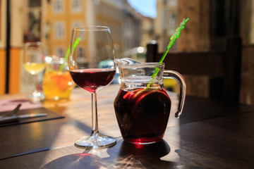 Sanrgiya with fruit ingredients in the decanter. Dripping on the glass.