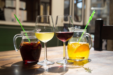 Sanrgiya with fruit ingredients in the decanter. Dripping on the glass.
