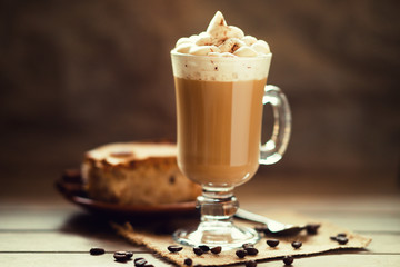 Glass of cup coffee with cream 