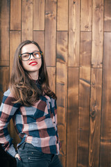 Fototapeta premium Cool hipster student woman wearing eyewear glasses . Caucasian female university student looking at camera smiling happy.
